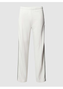 Spodnie dresowe z elastycznym ściągaczem ze sklepu Peek&Cloppenburg  w kategorii Spodnie męskie - zdjęcie 169460187