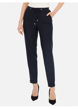 Granatowe spodnie damskie z gumką w pasie L'AF Liberty ze sklepu Eye For Fashion w kategorii Spodnie damskie - zdjęcie 169464775