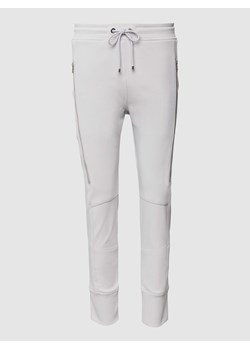 Spodnie materiałowe o kroju slim fit z ozdobnymi zamkami błyskawicznymi model ‘Future’ ze sklepu Peek&Cloppenburg  w kategorii Spodnie damskie - zdjęcie 169471698