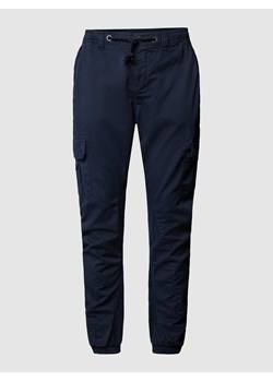 Spodnie sportowe z kieszeniami cargo w jednolitym kolorze ze sklepu Peek&Cloppenburg  w kategorii Spodnie męskie - zdjęcie 169484757