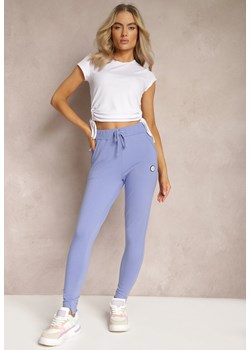 Niebieskie Spodnie Dresowe Ozdobione Małą Naszywką Nulorea ze sklepu Renee odzież w kategorii Spodnie damskie - zdjęcie 169507998
