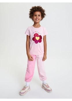 Sinsay - Spodnie dresowe jogger - różowy ze sklepu Sinsay w kategorii Spodnie dziewczęce - zdjęcie 169543138