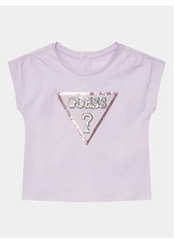 Guess T-Shirt K4GI11 K6YW4 Fioletowy Regular Fit ze sklepu MODIVO w kategorii Bluzki dziewczęce - zdjęcie 169570137