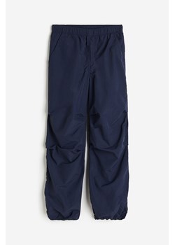 H & M - Spodnie spadochronowe - Niebieski ze sklepu H&M w kategorii Spodnie chłopięce - zdjęcie 169592158