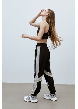 H & M - Przeciwdeszczowe spodnie sportowe - Czarny ze sklepu H&M w kategorii Spodnie damskie - zdjęcie 169592785