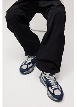H & M - Nylonowe spodnie spadochronowe Loose Fit - Czarny ze sklepu H&M w kategorii Spodnie męskie - zdjęcie 169597797