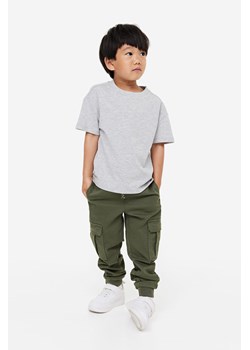H & M - Spodnie cargo Slim Fit - Zielony ze sklepu H&M w kategorii Spodnie chłopięce - zdjęcie 169599106