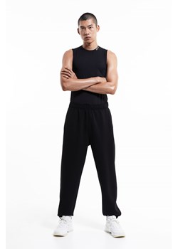 H & M - Joggersy sportowe DryMove - Czarny ze sklepu H&M w kategorii Spodnie męskie - zdjęcie 169599335