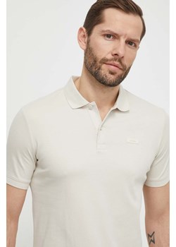 Calvin Klein polo bawełniane kolor beżowy gładki ze sklepu ANSWEAR.com w kategorii T-shirty męskie - zdjęcie 169601367