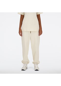 Spodnie damskie New Balance WP41513LIN – beżowe ze sklepu New Balance Poland w kategorii Spodnie damskie - zdjęcie 169602508