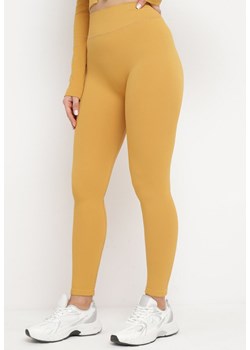 Żółte Legginsy z Elastycznej Prążkowanej Dzianiny Ichorsa ze sklepu Born2be Odzież w kategorii Spodnie damskie - zdjęcie 169616547
