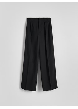 Reserved - Spodnie z surowym wykończeniem - czarny ze sklepu Reserved w kategorii Spodnie damskie - zdjęcie 169639866
