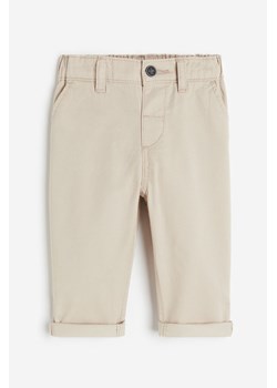 H & M - Bawełniane spodnie chinos - Beżowy ze sklepu H&M w kategorii Spodnie i półśpiochy - zdjęcie 169648157