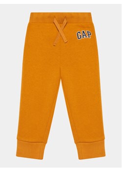 Gap Spodnie dresowe 748000-07 Brązowy Regular Fit ze sklepu MODIVO w kategorii Spodnie chłopięce - zdjęcie 169657829