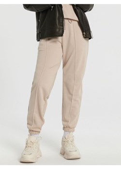 Sinsay - Spodnie dresowe - beżowy ze sklepu Sinsay w kategorii Spodnie damskie - zdjęcie 169660465