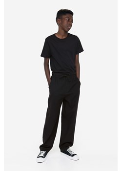 H & M - Spodnie z domieszką lnu Loose Fit - Czarny ze sklepu H&M w kategorii Spodnie chłopięce - zdjęcie 169675106