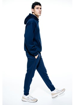 H & M - Zwężane sportowe joggersy - Niebieski ze sklepu H&M w kategorii Spodnie męskie - zdjęcie 169677387