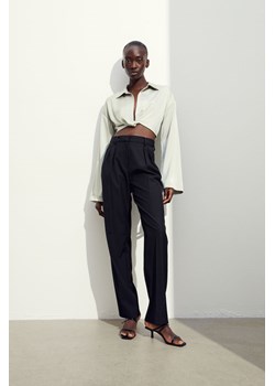 H & M - Zwężane spodnie - Czarny ze sklepu H&M w kategorii Spodnie damskie - zdjęcie 169677759