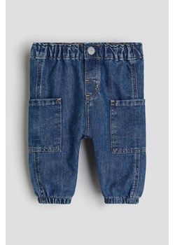 H & M - Dżinsy z naszywanymi kieszeniami - Niebieski ze sklepu H&M w kategorii Spodnie i półśpiochy - zdjęcie 169677799