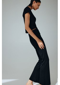 H & M - Rozszerzane spodnie dżersejowe - Czarny ze sklepu H&M w kategorii Spodnie damskie - zdjęcie 169679987