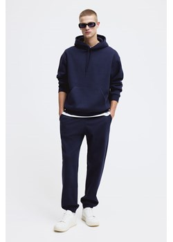 H & M - Spodnie dresowe Regular Fit - Niebieski ze sklepu H&M w kategorii Spodnie męskie - zdjęcie 169682098