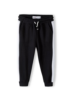 Czarne spodnie dresowe dziewczęce z lampasami ze sklepu 5.10.15 w kategorii Spodnie dziewczęce - zdjęcie 169684105