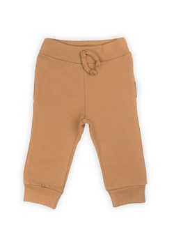 Beżowe spodnie dresowe z bawełny dla niemowlaka ze sklepu 5.10.15 w kategorii Spodnie i półśpiochy - zdjęcie 169685429