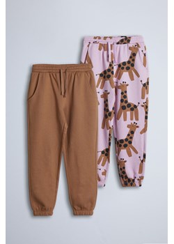 Spodnie dresowe - brązowe i różowe w żyrafy - 2pak - Limited Edition ze sklepu 5.10.15 w kategorii Spodnie dziewczęce - zdjęcie 169686988