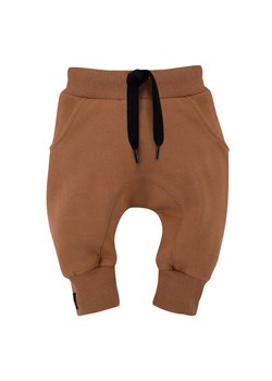 Bawełniane spodnie chłopięce Le Tigre - brązowe ze sklepu 5.10.15 w kategorii Spodnie i półśpiochy - zdjęcie 169687788
