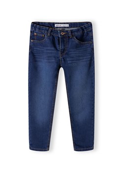 Ciemnoniebieskie klasyczne jeansy dopasowane dla niemowlaka ze sklepu 5.10.15 w kategorii Spodnie i półśpiochy - zdjęcie 169689445