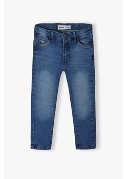 Ciemnoniebieskie spodnie jeansowe chłopięce skinny ze sklepu 5.10.15 w kategorii Spodnie chłopięce - zdjęcie 169689695
