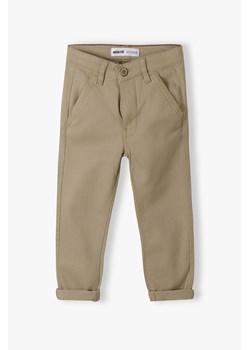 Beżowe spodnie chłopięce typu chinosy z bawełny ze sklepu 5.10.15 w kategorii Spodnie chłopięce - zdjęcie 169692689