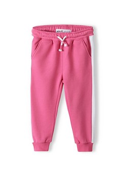 Różowe spodnie dresowe niemowlęce z białymi paskami ze sklepu 5.10.15 w kategorii Spodnie i półśpiochy - zdjęcie 169694496