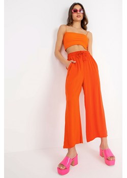Pomarańczowe spodnie damskie z wiskozy SUBLEVEL ze sklepu 5.10.15 w kategorii Spodnie damskie - zdjęcie 169695857