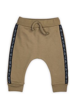 Bawełniane spodnie chłopięce Space - brązowe ze sklepu 5.10.15 w kategorii Spodnie i półśpiochy - zdjęcie 169699785