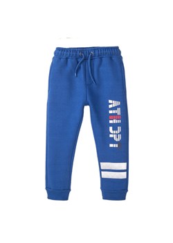 Spodnie dresowe niemowlęce niebieskie ze sklepu 5.10.15 w kategorii Spodnie i półśpiochy - zdjęcie 169699799