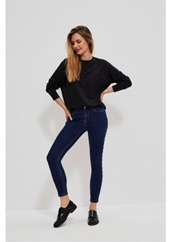 Granatowe spodnie damskie jeansowe rurki z dżetami ze sklepu 5.10.15 w kategorii Jeansy damskie - zdjęcie 169707285
