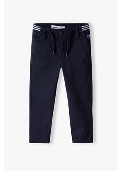 Granatowe spodnie chinosy bawełnianie chłopięce ze sklepu 5.10.15 w kategorii Spodnie chłopięce - zdjęcie 169720098