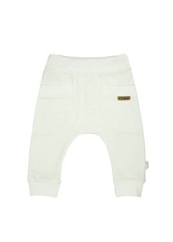 Kremowe spodnie dresowe dla dziewczynki typu baggy ze sklepu 5.10.15 w kategorii Spodnie dziewczęce - zdjęcie 169721099