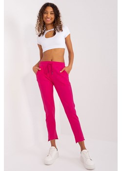 Spodnie basic z asymetrycznymi nogawkami fuksjowy ze sklepu 5.10.15 w kategorii Spodnie damskie - zdjęcie 169722725