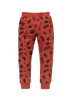 Luźne spodnie niemowlęce z bawełny Let's rock czerwone ze sklepu 5.10.15 w kategorii Spodnie chłopięce - zdjęcie 169725337