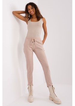 Spodnie basic z asymetrycznymi nogawkami beżowy ze sklepu 5.10.15 w kategorii Spodnie damskie - zdjęcie 169727505