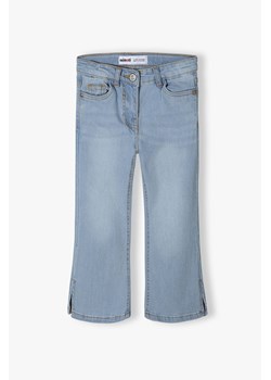 Spodnie jeansowe niemowlęce rozkloszowane ze sklepu 5.10.15 w kategorii Spodnie i półśpiochy - zdjęcie 169728899