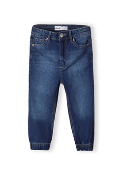 Niemowlęce jeansy o kroju joggerów z mankietami u dołu ze sklepu 5.10.15 w kategorii Spodnie i półśpiochy - zdjęcie 169729137