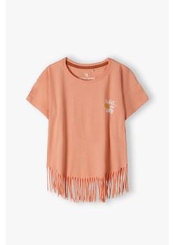 Pomarańczowy t-shirt bawełniany dla dziewczynki z frędzlami ze sklepu 5.10.15 w kategorii Bluzki dziewczęce - zdjęcie 169729436
