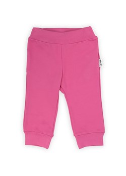 Różowe spodnie dresowe niemowlęce z dzianiny ze sklepu 5.10.15 w kategorii Spodnie i półśpiochy - zdjęcie 169729975
