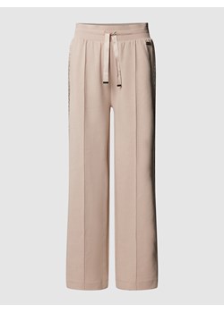 Spodnie dresowe o kroju regular fit z lampasami model ‘Arya’ ze sklepu Peek&Cloppenburg  w kategorii Spodnie damskie - zdjęcie 169737256