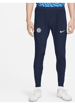 Męskie spodnie piłkarskie Nike Dri-FIT ADV Chelsea F.C. Strike Elite - Niebieski ze sklepu Nike poland w kategorii Spodnie męskie - zdjęcie 169754497