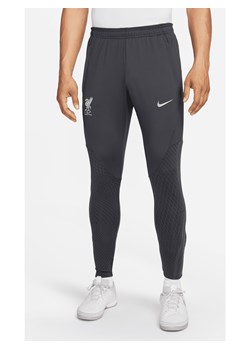Męskie spodnie piłkarskie Nike Dri-FIT Liverpool F.C. Strike - Szary ze sklepu Nike poland w kategorii Spodnie męskie - zdjęcie 169754527