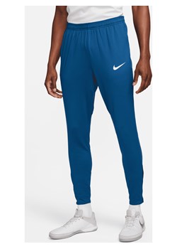 Męskie spodnie piłkarskie Dri-FIT Nike Strike - Niebieski ze sklepu Nike poland w kategorii Spodnie męskie - zdjęcie 169754646